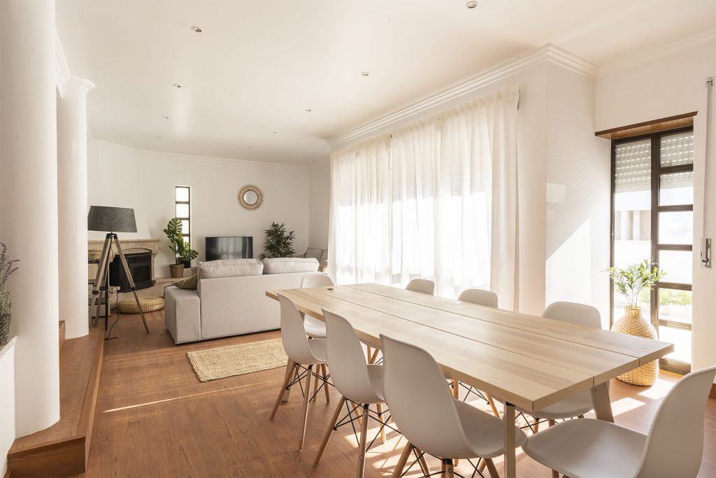 Ericeira Paradise Guest House and Suites Sunny bright living room and dining room with modern decor