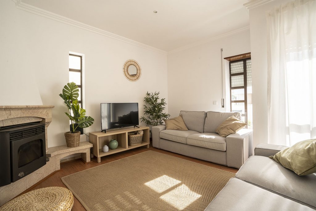 Ericeira Paradise Guest House Bright Sunny Living Room For Coworking and Relaxing with TV and plants