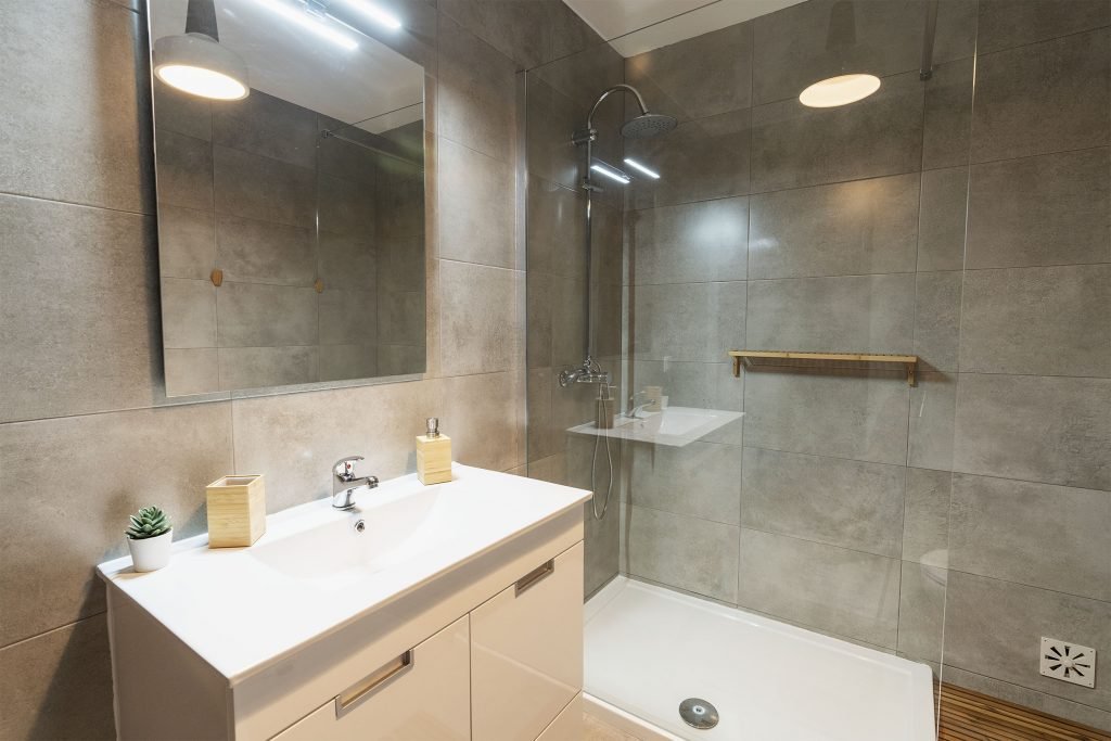 Clean bathroom with cubic minimalist decorations