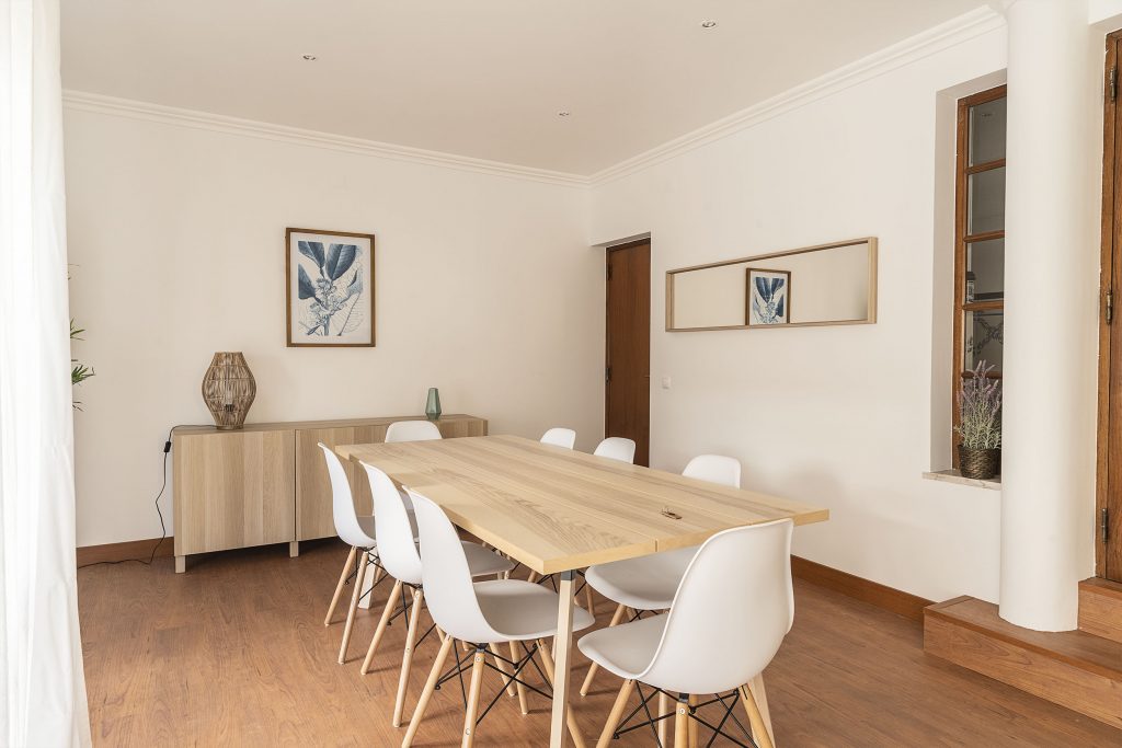 Ericeira Paradise Guest House Coworking spaces, a minimalist table with beautiful decorations in Portugal